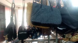A variety of functional and stylish bags commonly found in Ugandan retail markets.